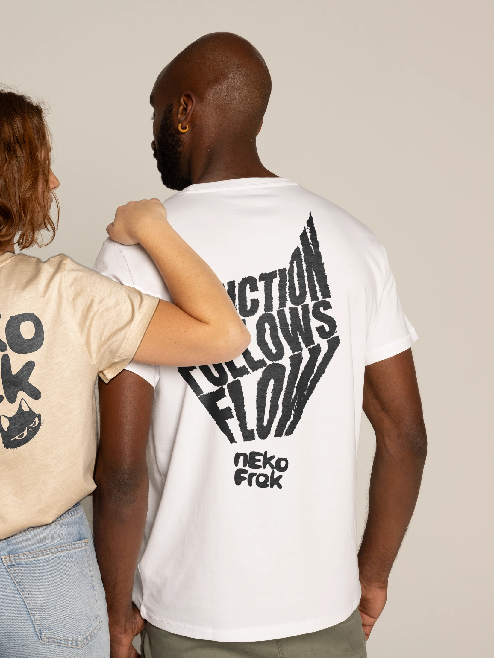 Man wearing a Nekofrek Function Follows Flow tee